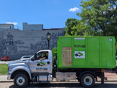 Dumpster Rental in front of Chesapeake mural